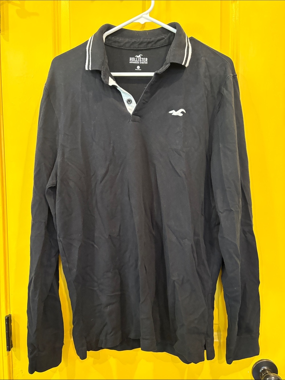 Hollister Men's Long-Sleeve Polo in Black with White Trim